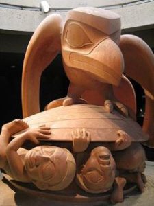On Raven in Myths of the North: Raven creating people from a clam shell. Sculpture by Bill Reid.